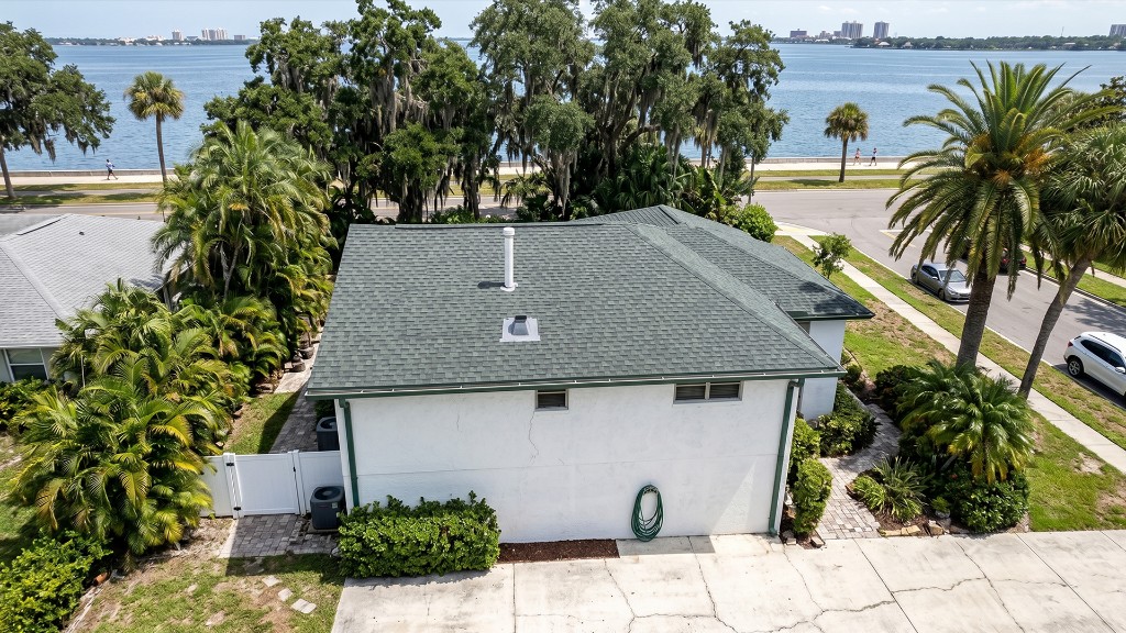 South Tampa roof replacement forest green shingles waterfront home Tampa FL