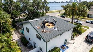 South Tampa roof replacement shingle repair in progress waterfront Tampa FL